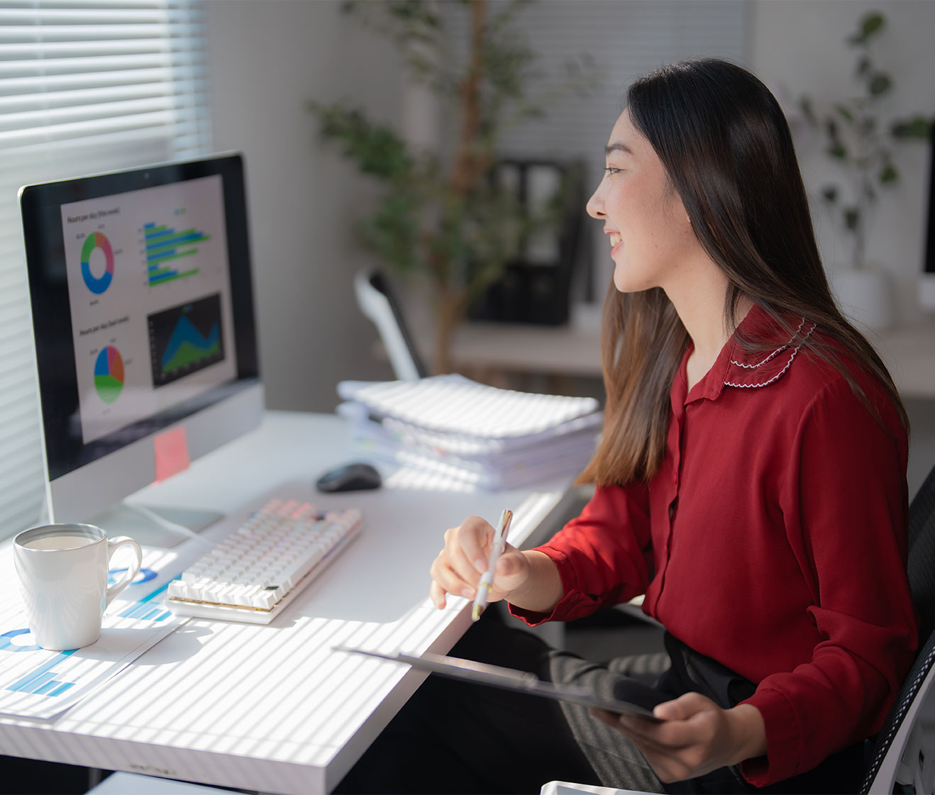 A confident woman reviewing her financial statements